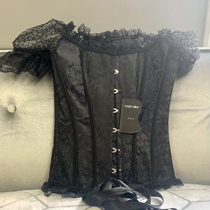 Corset story new with tags black bustier blouse with sleeves.